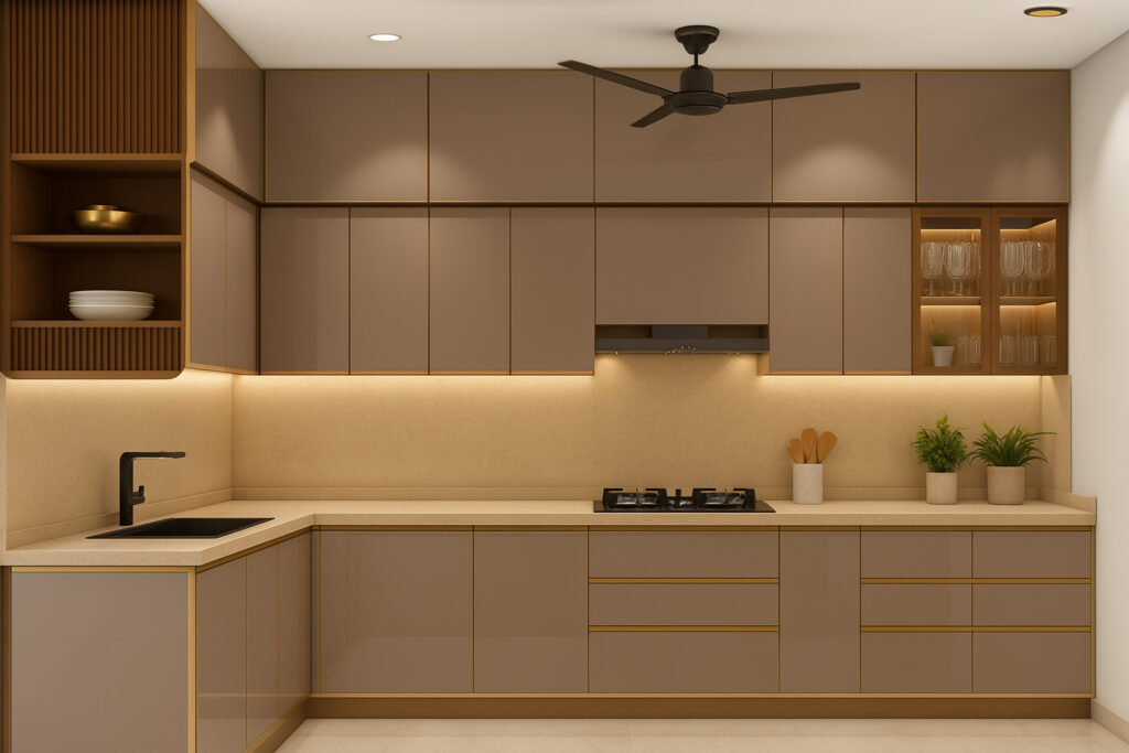 Modern modular kitchen featuring matte taupe cabinetry with gold trims and sleek beige countertops in a L-shaped layout. The design includes integrated cooktop, chimney, and black sink, with wall-mounted glass cabinets, open wood shelving, and under-cabinet LED lighting. Minimalist decor highlights neatly arranged tableware, potted plants, wooden utensils, and glassware, creating an inviting, streamlined, and functional workspace.